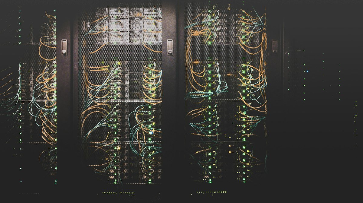 Colorful network cables and rack lights in a server closet